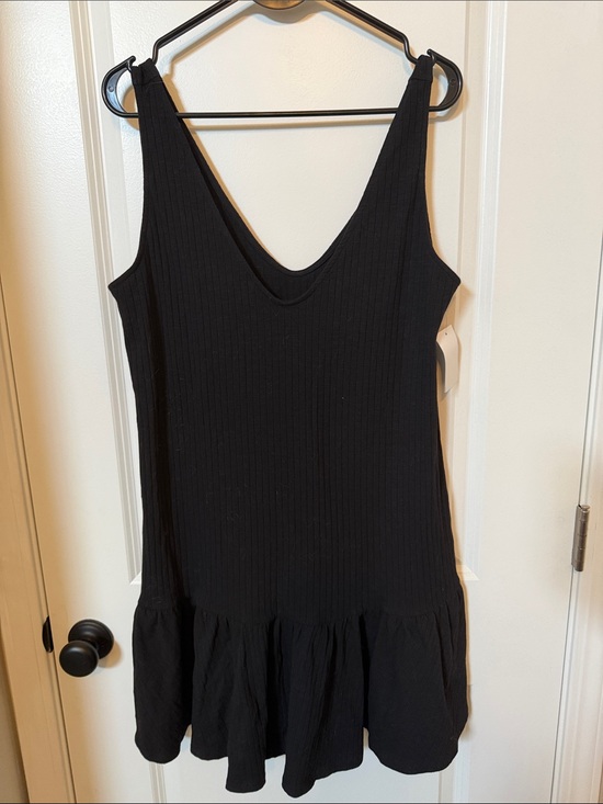 Elodie Dresses & Skirts - Elodie Black Ribbed Sleeveless Mini Dress with Flounce Hem